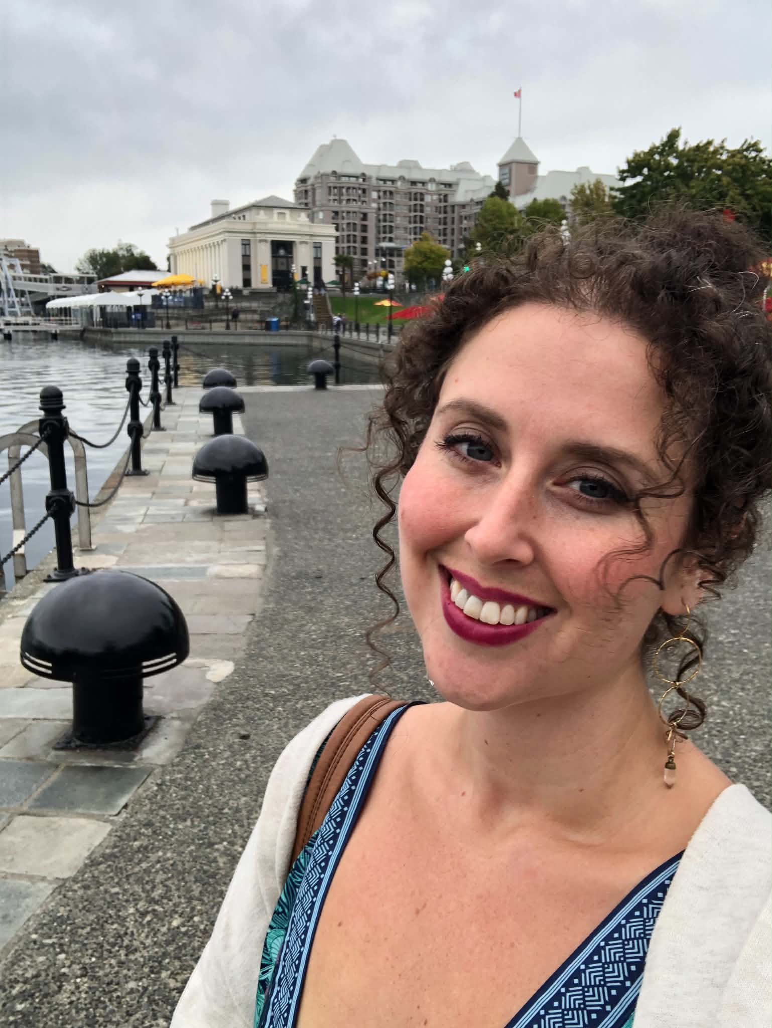 Kirsten Koel smiling beside the waterfront